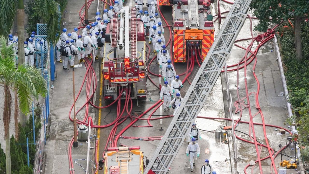 Hongkongers mourn fire victims at citywide condolence points; toll at 128