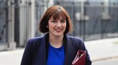 Minister defends 'pragmatic' U-turn on unfair dismissal manifesto pledge