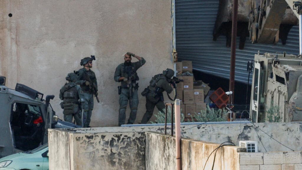 Israel forces kill two Palestinians seen surrendering in West Bank raid