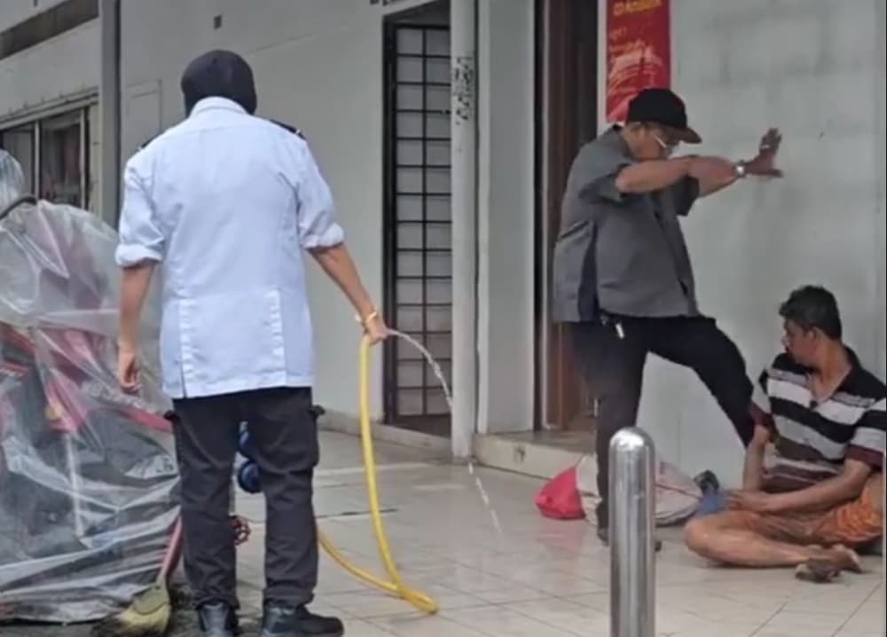 Viral video of homeless man kicked while sleeping reveals migrant workerโs nightmare in Malaysia